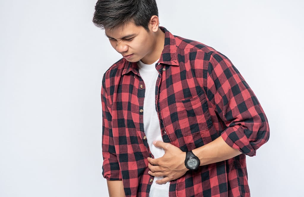 Man heeft last van zijn buik, bijwerkingen probiotica