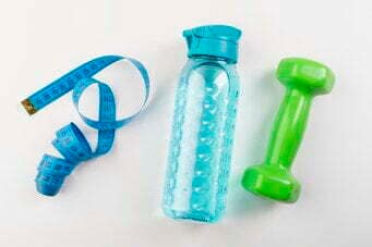 flesje water en dumbell